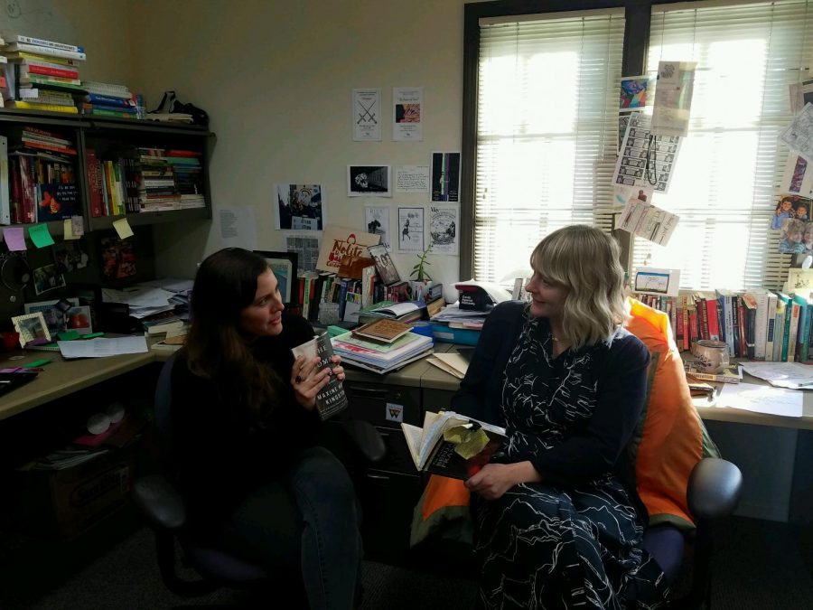 Ms. Stevenson (left) and Ms. Yurcak (right) discuss their favorite books.