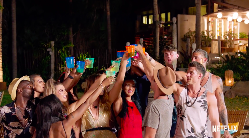 The contestants make a toast after celebrating the night’s events. 