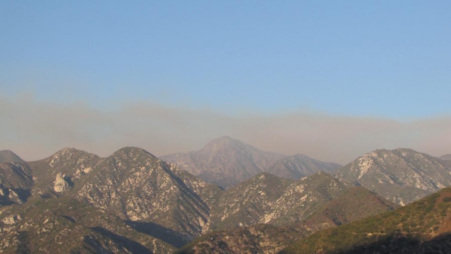 Smoke from the Bobcat fire hangs over the San Gabriel Mountains