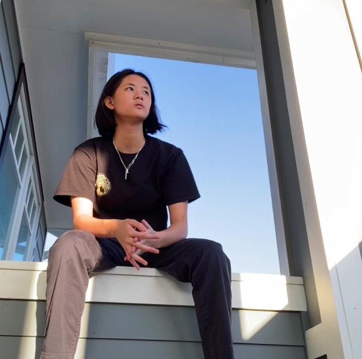 Rachel K on a balcony enjoying the view