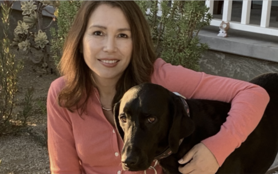 Ms. Dague with her dog, Holly.