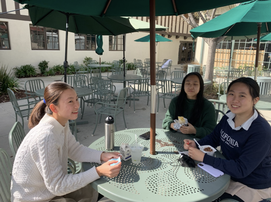 Westridge freshman Fiona Z., Jennifer L., and Cecilia P. hang out maskless outdoors for the first time since the beginning of the pandemic. 