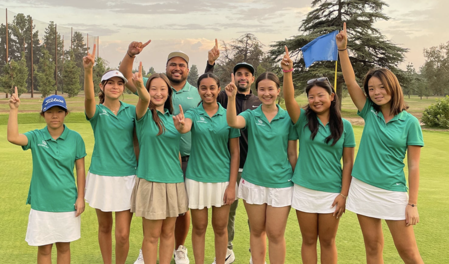 Varsity+Golf+poses+for+a+photo+after+they+were+crowned+league+champions+for+the+fourth+straight+season.