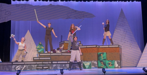 Cast practice their scenes on stage, getting used to the platforms.