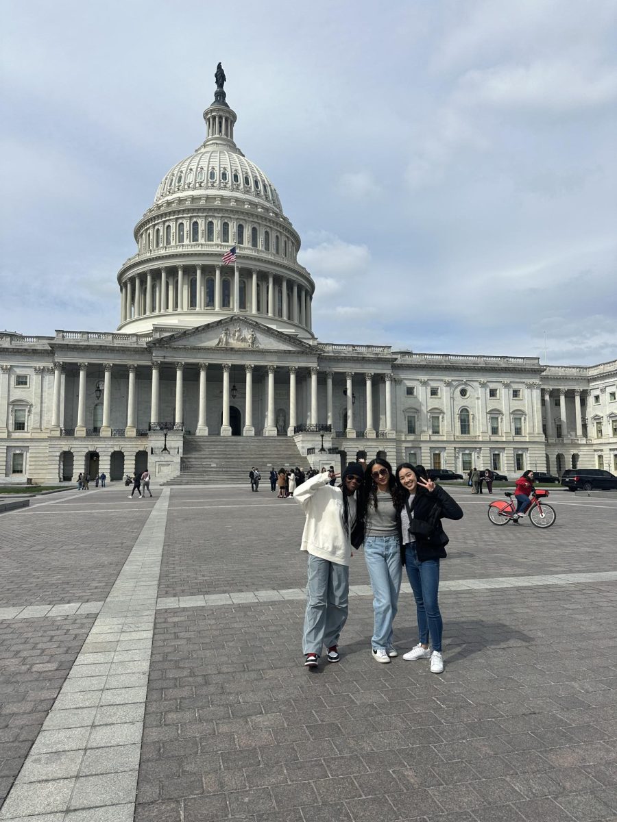 Juniors Lauren L., Jaedyn T., and Kristen D. in front of the U.S. Capitol