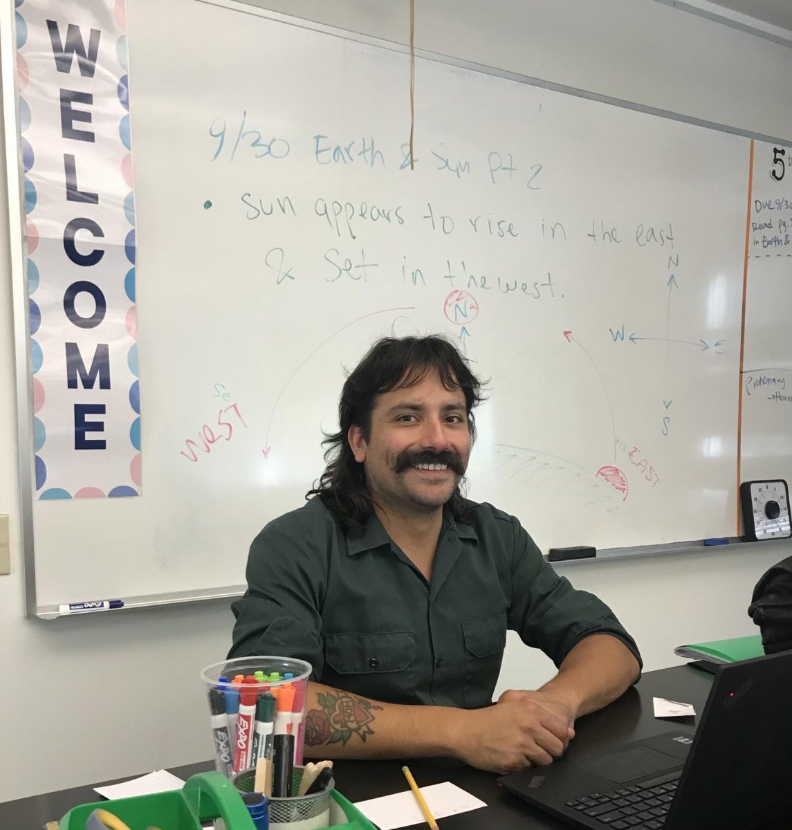  Mr. Carabajal in his space of creativity and inclusion (aka his classroom). Even the "welcome" sign serves as an indication of his values. 