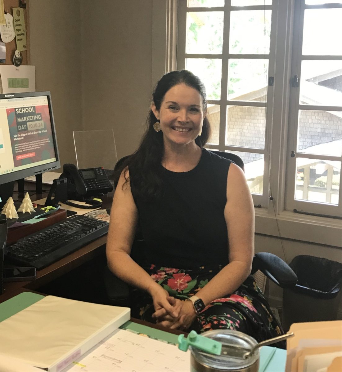 Ms. Forester, sitting in her Pitcairn House office, enjoys roller skating and watching movies.