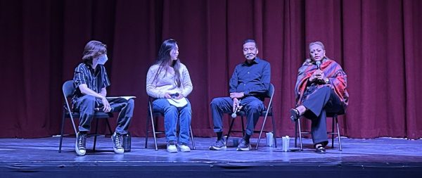 Left to Right: Miranda F. ’25, Fiona Z. ’25, Mr. Steve Gibson, and Ms. Michelle del Rosario Martinez sit onstage to engage in civil discourse. 