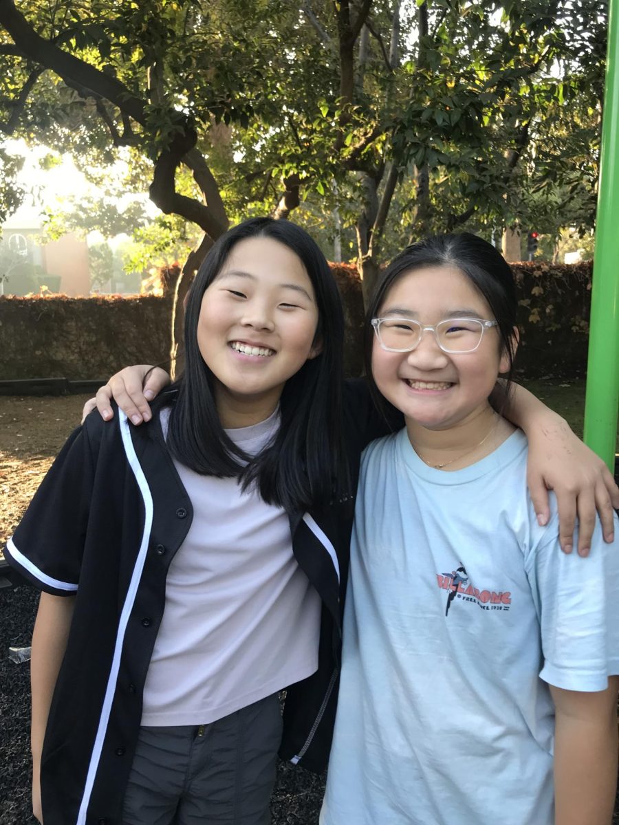 Ellie K. ’32 (left) and Arya L. ’32 (right) “On Korean Thanksgiving, we make this thing that is kind of like a dumpling rice cake. There’s a filling with sesame seeds. It’s less savory and more of a sweet flavor."