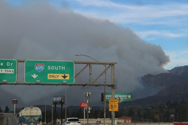 On the morning of Wednesday, January 8, 2025, smoke from the Eaton Fire crowds the sky.