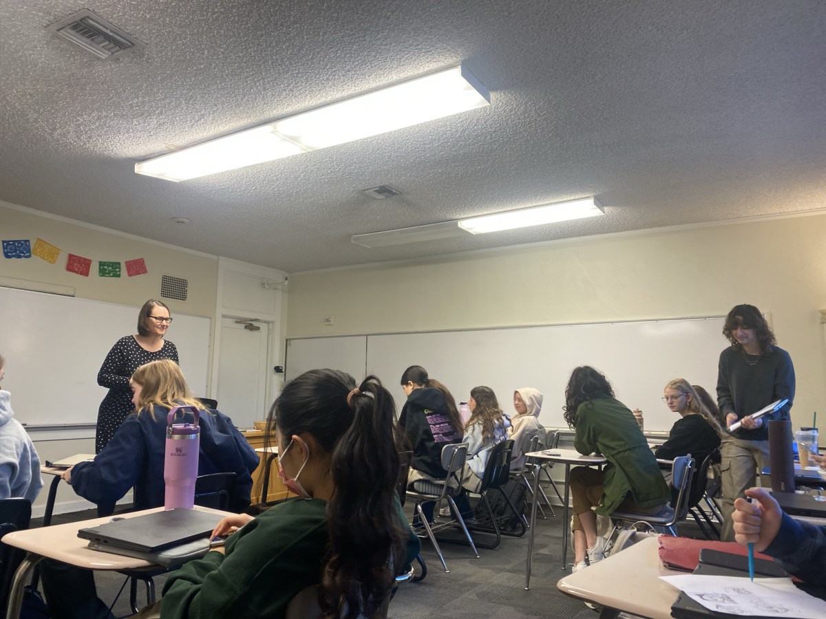 (Charlotte H. '29) Students of different ages listen in World Languages and Cultures Department Chair Dr. Vicki Garrett's Spanish III class.