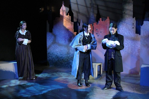 Here I am as Mr. Ferguson, my favorite role, in my favorite scene, holding my favorite prop, Baby Harold.
