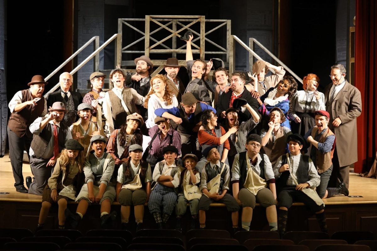 The cast of IVRT's Newsies doing silly poses. (DawnEllen Ferry)