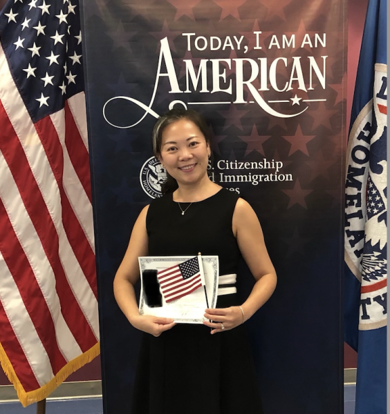 When Ms. Shang arrived in the United States in 2012, she applied for permanent residency and fell in love with America’s culture of freedom and exploration, prompting her to consider obtaining her citizenship during the COVID-19 pandemic. Here, she is holding her official certificate during the citizenship ceremony.