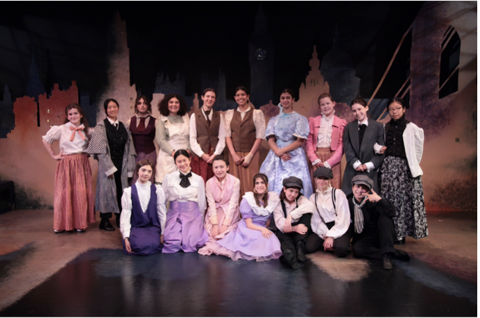 The cast gathered for a victory photo on opening night.