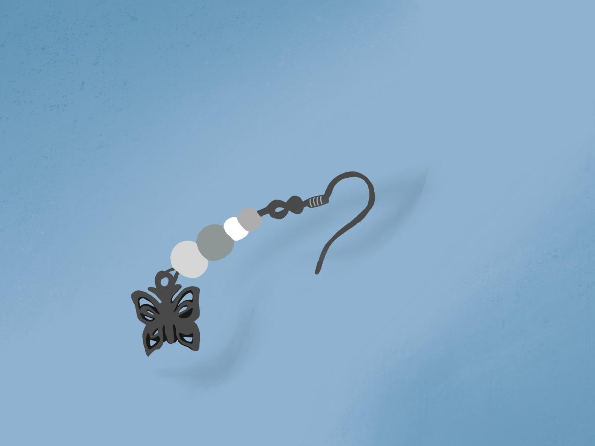 Missing its pair, the lonely earring I hold onto, while my other one remains lost.