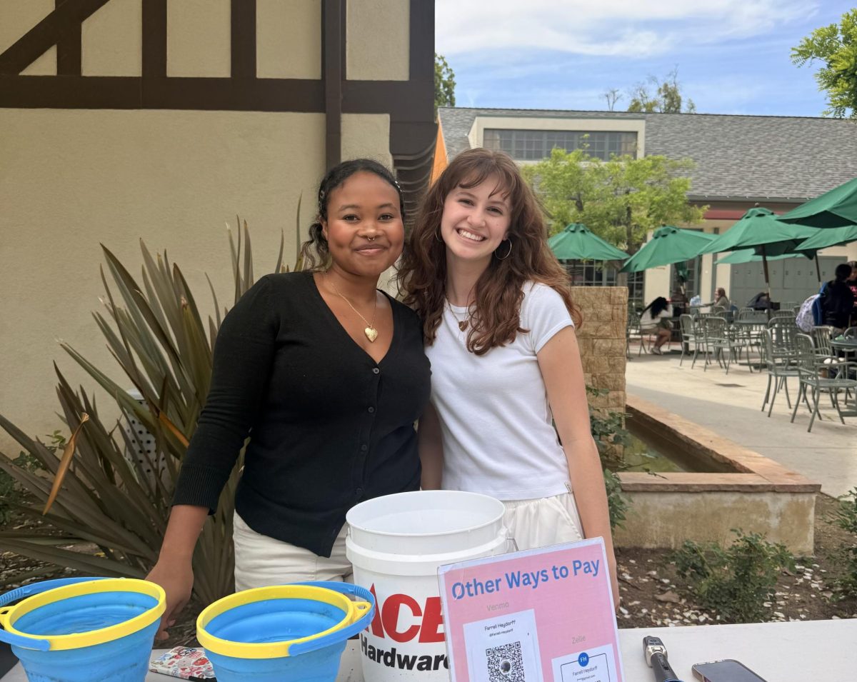 Ivory P. ’27 and Nadine M. ’27 cleaning up after a Soak-A-Senior fundraiser on Thursday, April 16th. 