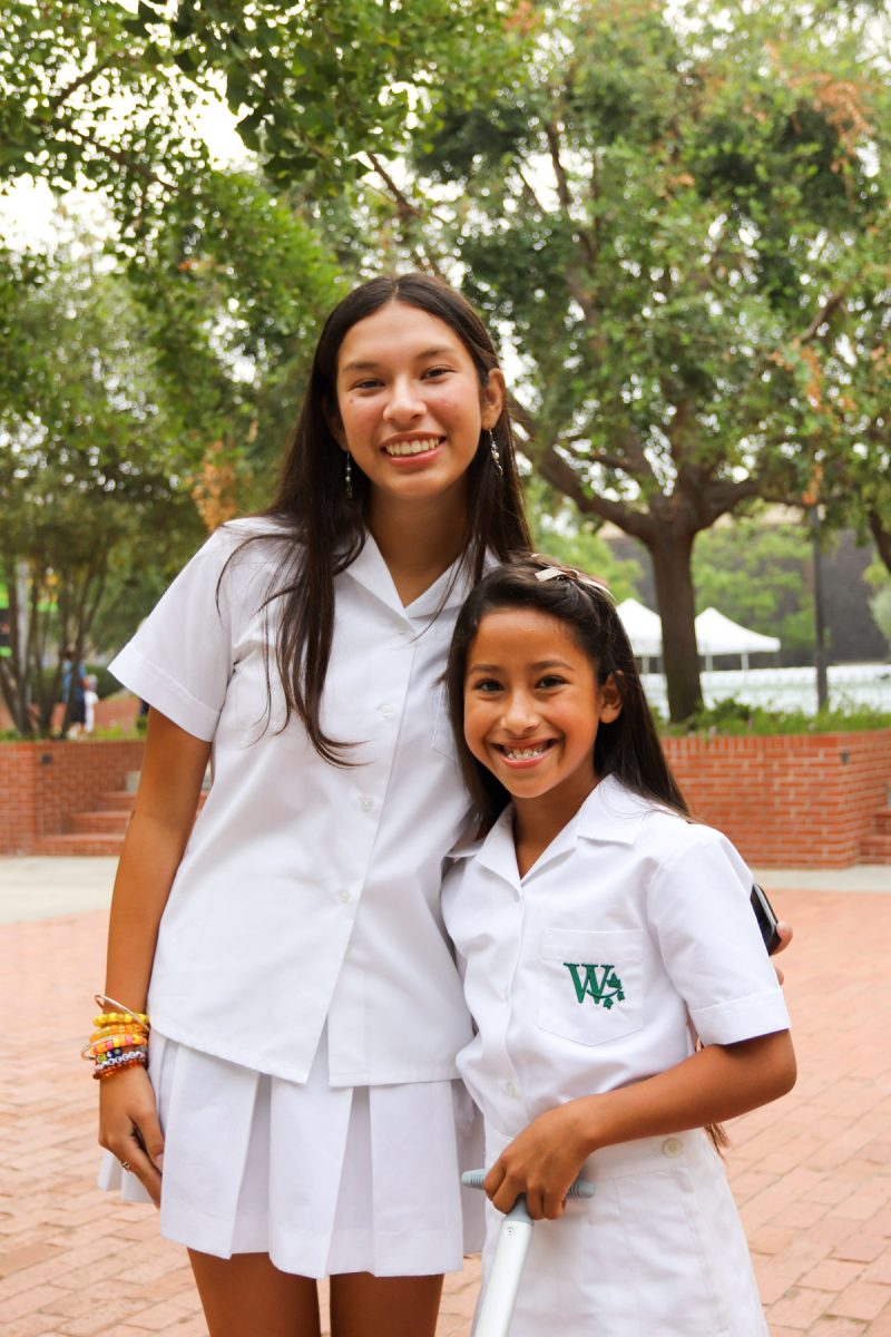 Spyglass Managing Editor Rebecca L. '27 greets her fifth grade cub, Nia C., highlighting how cross-grade connections continue beyond Tigers, Cubs, and Stripes meetings